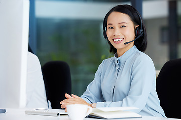 Image showing Asian woman, call center employee and happy in portrait, communication and CRM, headset with mic in office. Contact us, customer service or telemarketing, female consultant with smile and help desk