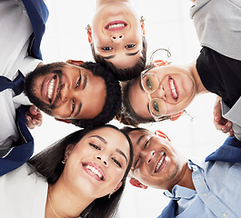 Image showing Team building, support or portrait of business people in huddle for collaboration, partnership or community. Faces, low angle or happy group of workers with smile, mission goals or target together