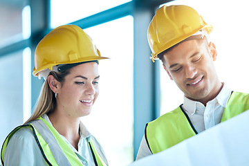 Image showing Architect, team and planning with blueprint for construction or architecture with smile for on site project. Man and woman contractors in building floor plan or teamwork strategy with safety helmets