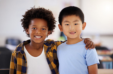 Image showing Education, portrait or boy children in classroom learning or studying in preschool together with support. Development, diversity or happy students with growth mindset for knowledge in kindergarten