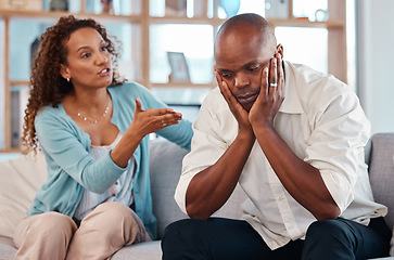 Image showing Couple, fight and angry on sofa for marriage problems, conflict and bad communication. Divorce, argument and frustrated people in anger with man, woman and partner in living room for blame of affair