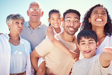 Image showing Big family, crazy portrait of grandparents and kids with mom, dad and smile, happy bonding together on ocean vacation. Sun, fun and happiness for generations of men and women with children on holiday