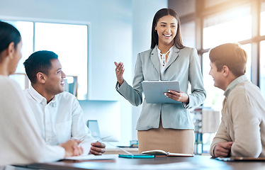 Image showing Business meeting, presentation and people with tablet for conference, seminar or workshop in corporate planning. Professional woman, manager or speaker speaking to clients, employees or happy staff