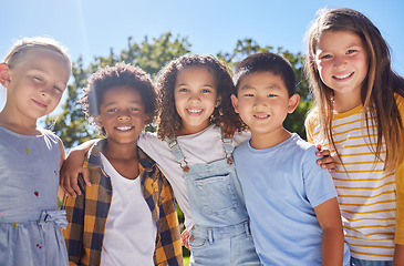 Image showing Friendship, kids and portrait of friends in a park playing together outdoor in nature. Happiness, diversity and children with a smile standing, embracing and bonding in a outside garden or playground