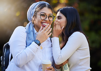 Image showing Friends, gossip and women talking, outdoor and share news with smile, surprise an cheerful together. Girls, female students and young people with happiness, whisper in ear and conversation in park