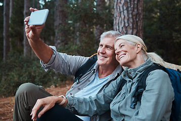 Image showing Senior couple, selfie and hiking in forest, happy people in nature with memory and social media post. Smile in picture, adventure and fitness, old man and woman with active lifestyle and outdoor