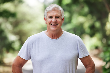 Image showing Senior man, exercise and portrait outdoor for run, workout and training on road with trees for fitness. Elderly male person smile for cardio health and wellness while walking or running in retirement
