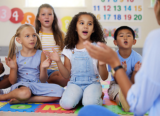 Image showing Teacher, singing or kids in classroom learning a song together in preschool for voice development. Children daycare, vocal or young students in poem or musical performance in kindergarten creche