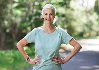 Image showing Senior woman, exercise and outdoor for a run, workout and training on road with trees for fitness. Elderly female person happy about cardio for health and wellness while walking or running in summer