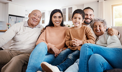 Image showing Relax, portrait and generations of family on sofa together, laughing and smiling in interracial home. Men, women and happy children on couch with grandparents, parents and kid in house living room.