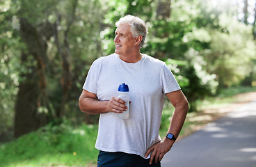 Image showing Man, exercise and thinking outdoor with water bottle for a run, workout and training for fitness. Senior male happy for hydration and cardio health or wellness while running in nature in retirement