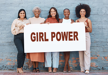 Image showing Women, diversity and banner for empowerment on billboard, mockup or advertising board. Strong entrepreneur female group portrait with poster, paper or power sign for announcement or voice