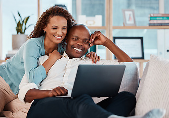 Image showing Laptop, relax and a couple watching a movie on a sofa in the living room of their home together for entertainment. Computer, video or streaming with a man and woman enjoying a series while bonding