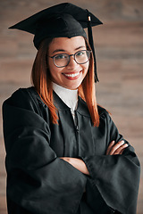 Image showing Graduation cap, proud portrait and woman isolated on wood background happy education, college or scholarship success. Biracial person, university student or graduate with learning knowledge mindset