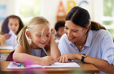 Image showing Teacher, learning or helping girl with drawing in classroom, studying or assessment. Teaching, development or kid or student with happy woman for education, assistance or art notebook in kindergarten