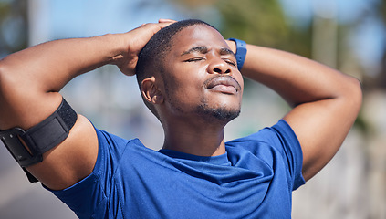 Image showing Training, fitness and tired black man runner with sun on face for break from exercise, cardio or running. Workout, stop and breathe by athletic male relax outside for marathon, run or sport routine