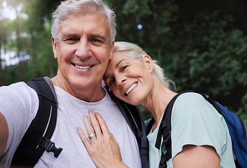 Image showing Selfie portrait, hiking and mature couple hug in forest, fitness love and outdoor health with happy blog update. Nature, travel and trekking face of mature people in woods with profile picture post