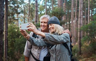 Image showing Selfie, forest and hiking, old couple on nature walk taking picture for retirement vacation in Peru. Travel, senior man and mature woman with phone on hike with love and health on holiday adventure.