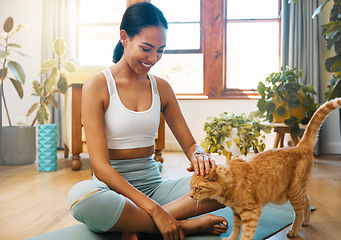 Image showing Fitness, yoga or happy woman bonding with cat or pet animal relaxing for wellness or healthy lifestyle. Smile, calm or zen girl loves caring, quality time or playing with kitten or kitty at home