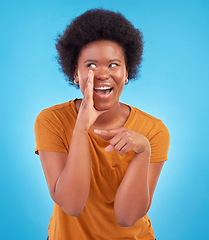 Image showing Black woman, drama and secret gossip in studio, sharing exciting confidential news on blue background. Deal announcement, whisper and happy African girl with afro, discussion isolated in privacy.