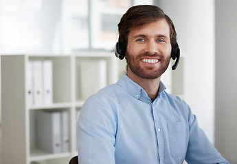 Image showing Smile, customer support and portrait of man at call center for b2b connection, contact us and crm consulting at desk. Telemarketing, communication and male worker for friendly service, trust and help