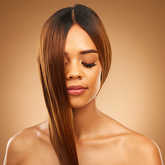 Image showing Haircare, face and style, woman in studio with strong hair, luxury brunette texture and salon shine. Female model, spa mockup and beauty, healthy straight hairstyle with keratin on brown background.