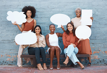 Image showing Business woman, friends and speech bubble in social media holding shapes or icons against a wall background. Portrait of happy women smile with poster shaped symbols for networking or communication