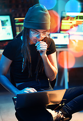 Image showing Woman, laptop and hacker thinking, typing or programming, software or cybersecurity. Neon, computer and it coder or programmer reading information for hacking idea while on dark web at night in home.