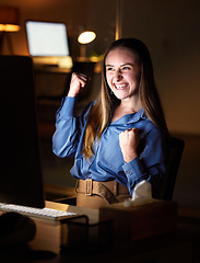 Image showing Night, computer and winning business woman celebrate stock market profit, company sales news or bonus online. Winner, celebration and yes of happy person reading for global trade or trading results