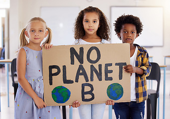 Image showing Kids, portrait and poster with friends in protest in a classroom holding a sign for eco friendly activism. Children, green and a kindergarten group standing together for community or ecology