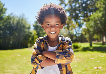 Image showing Portrait, arms crossed and black kid in nature, smile and vacation outdoor. Face, happiness and confident boy or child from South Africa having fun or enjoying summer holiday travel at park or garden