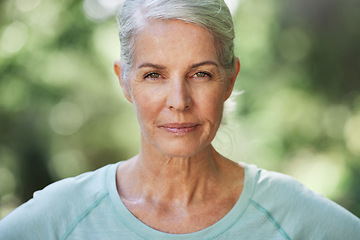 Image showing Portrait, exercise and senior woman with confidence, outdoor and training for wellness, healthy lifestyle and balance. Face, mature female and lady with serious workout, and retirement in a park