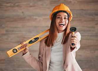 Image showing Engineer, business woman laugh and portrait of a property architect with construction tools. Safety helmet, stud detector and engineering gear for a home renovation project with female employee