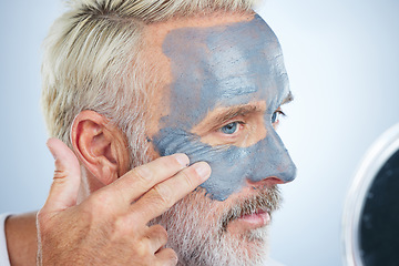 Image showing Mask, skincare and facial with man in studio for cleansing, detox and spa treatment. Cosmetics, beauty and dermatology with senior model on gray background for anti aging, product and natural