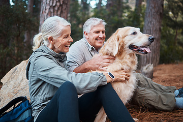 Image showing Senior couple, hiking and dog outdoor in nature for exercise, fitness and trekking for health and wellness. Old man, woman and golden retriever pet on hike in forest for workout, cardio and happiness