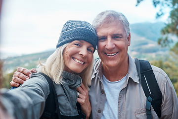 Image showing Old couple, selfie and portrait, hiking in forest and happy people in nature and memory for social media post. Smile in picture, adventure and fitness, man and woman with active lifestyle and outdoor