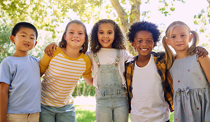 Image showing Portrait, kids and a group of friends standing in a line together outdoor, feeling happy while having fun. Diversity, school and smile with children in a row, posing arm around outside in a park