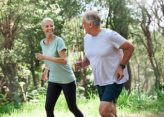 Image showing Senior couple, exercise and happy outdoor for run, workout and training for fitness. Old man and woman in forest for cardio health, motivation and wellness in retirement while running in nature