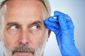 Image showing Senior, face closeup and needle of a man in a studio doing plastic surgery and cosmetic skincare. Dermatology, wrinkles and anti aging treatment of a mature model with silicone filler injection