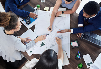 Image showing Business people, hands and planning construction above in meeting for team collaboration at office. Hand of architect group in teamwork strategy, brainstorming or discussing floor plan at workplace