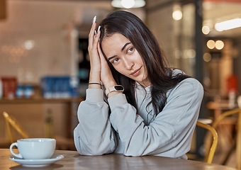 Image showing Cafe, relax and woman with coffee thinking in restaurant with hot beverage, cappuccino and latte drink. Happy, peace and girl sitting by table with contemplation, thoughtful and break on weekend