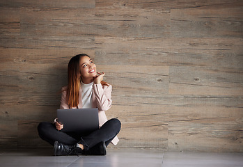 Image showing Happy woman, thinking and laptop with space for idea for advertising or mockup. Smile of female on wooden background for internet connection for computer search, promotion or student scholarship