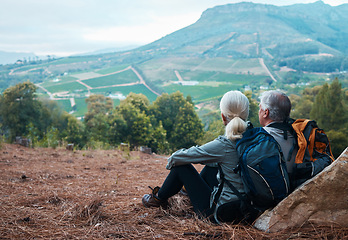 Image showing Retirement, hiking and old couple with relax with view of hill from back in Peru on holiday adventure. Travel, senior man and woman resting on cliff, hike or trekking with love, health and backpack.