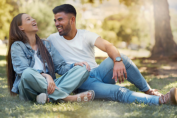 Image showing Couple are happy outdoor, laughing and relax together, love and care with trust in relationship and commitment. Happiness, support and freedom with man and woman in park with romance and bonding