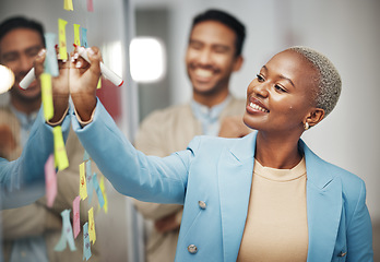 Image showing Businesswoman, planning and writing idea in meeting, calendar or agenda, sticky note or innovation. Idea, brainstorming and black woman leader with goal or problem solving, teamwork or solution