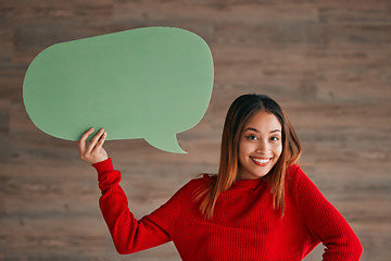 Image showing Business woman, speech bubble and portrait by wall with happiness, opinion and social media in workplace. Businesswoman, paper and poster for news, announcement and happy with sign, vote and voice