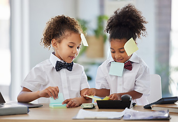 Image showing Children, together and playing office with sticky note at desk with happiness, brainstorming and teamwork. Kids, girl and group with paper, planning and play as business people for bond with games