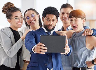 Image showing Selfie, happy and business people together with a tablet for team building and group fun. Funny, smile and a black man taking a photo with employees or friends on technology for an office memory