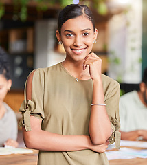 Image showing Portrait, mindset and designer with a business woman in the office, standing as a leader with her team in the boardroom. Face, vision and mission with a young female employee looking confident