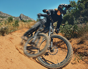 Image showing Cycling, fast and extreme sports with man on mountain bike for adventure, fitness and adrenaline junkie. Exercise, risk and motion blur with male athlete in nature for workout, training and speed